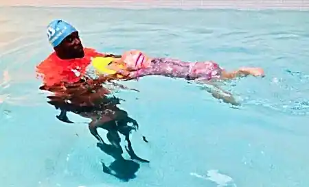 Superman, blowing bubbles