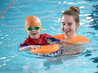 Cindy's Swim School boy swimming having fun toddler swim